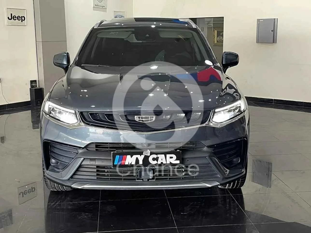 جيلي توجيلا 2023 اوتوماتيك 32,000 كم 4 سلندر دفع رباعي اس يو في رمادي تحت الضمان