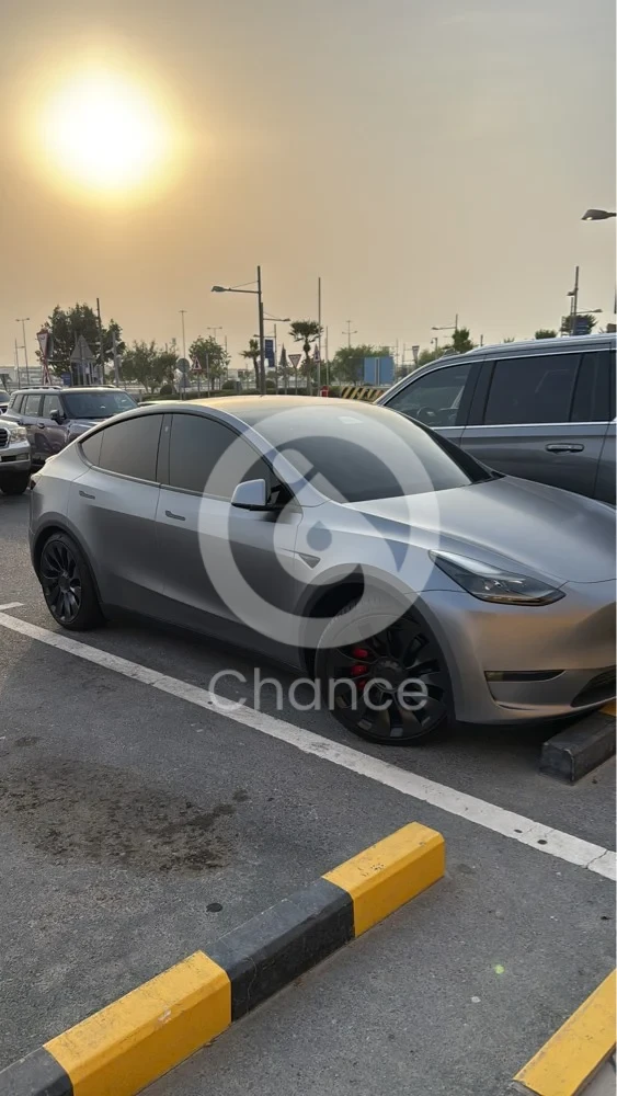 Tesla model Y 2024 performance Great condition 20k km white interior full body maat protection Qatar import under warranty comes with full coverage insurance till June 2026