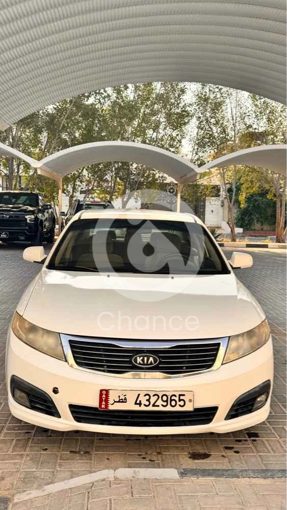 كيا اوبتيما السيارة بحالة ممتازة ونظيفة جداً ، قير /ماكينة/ شاس /مكيف
